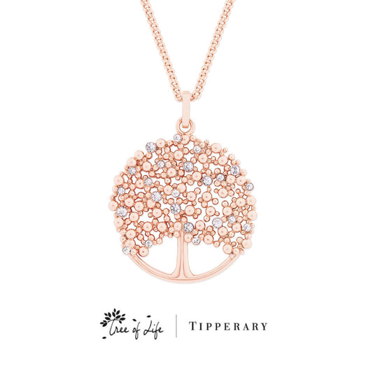 Tipperary Crystal Rose Gold Tree of Life Pendant with CZ Leaves  The tree of life is a symbol of a fresh start on life, positive energy, good health and a bright future. The symbolism of the Tree of Life is ultimately about the forces of nature combining to create balance and harmony. The branches reach for the sky, the roots reach down into the ground.