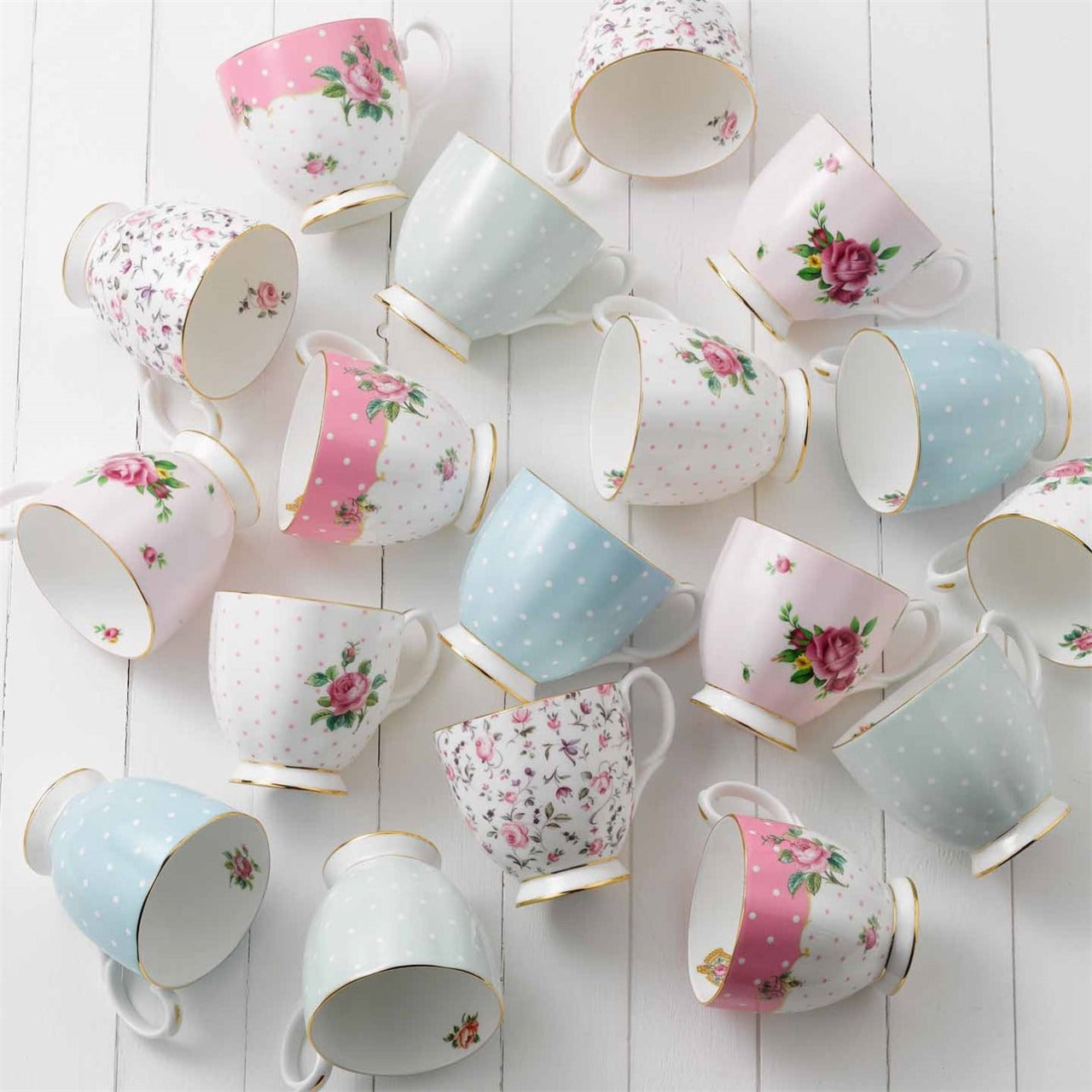 Wedgwood Royal Albert Polka Blue Mug  Vibrant and vivacious, Polka Blue is a beautiful addition to the vintage patterns that have made Royal Albert famous the world over. Youthful and exuberant, this collection is charmingly fashioned in fine bone china, and combines classic form with intricate detailing, vibrant colours and a lustrous gold rim.