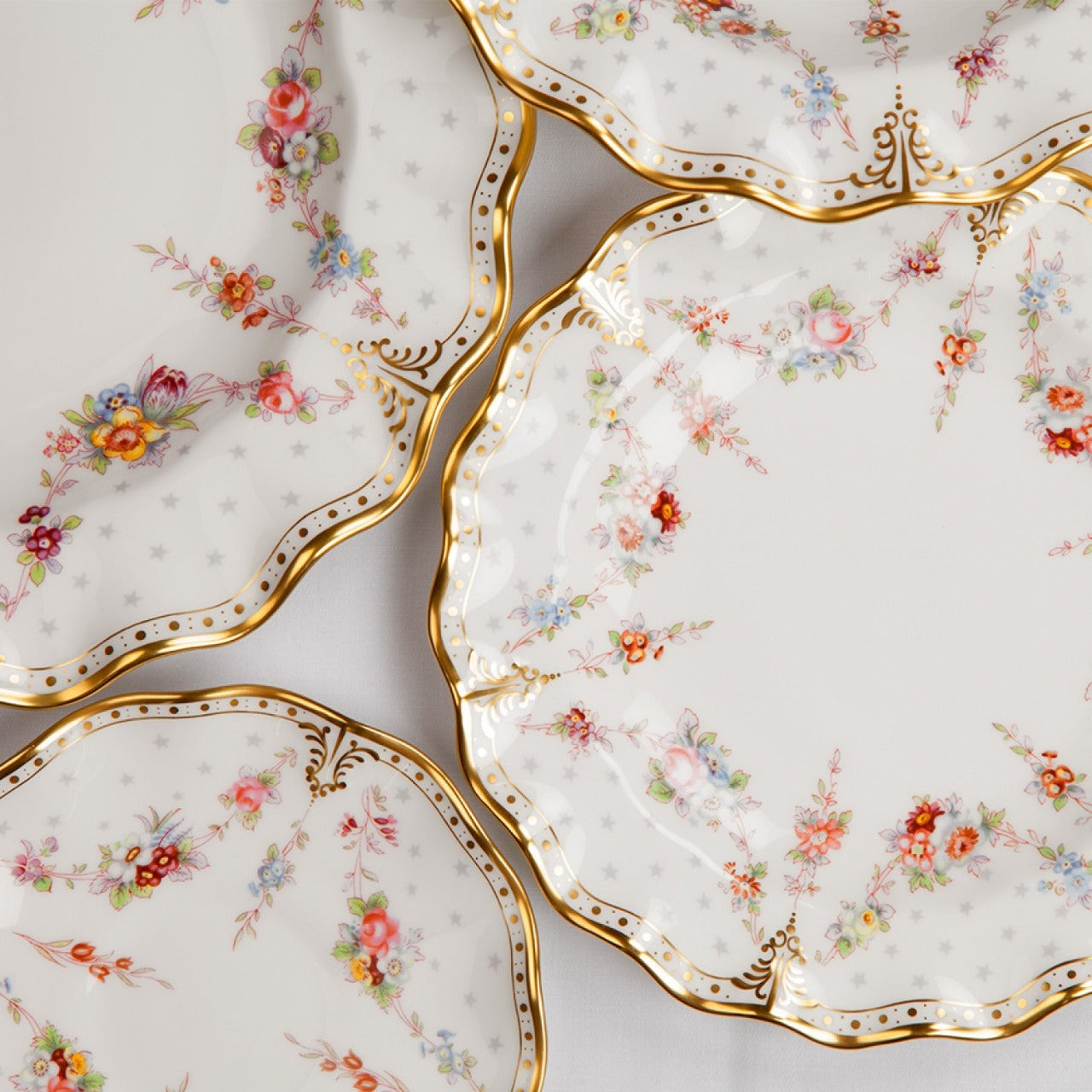 Royal Crown Derby Royal Antoinette Round Chop Dish 35 cm  A traditional Chop Dish with perfectly round edges that can be used as a serving plate for a multitude of meals and sides, making it a versatile addition to your tableware collection. 