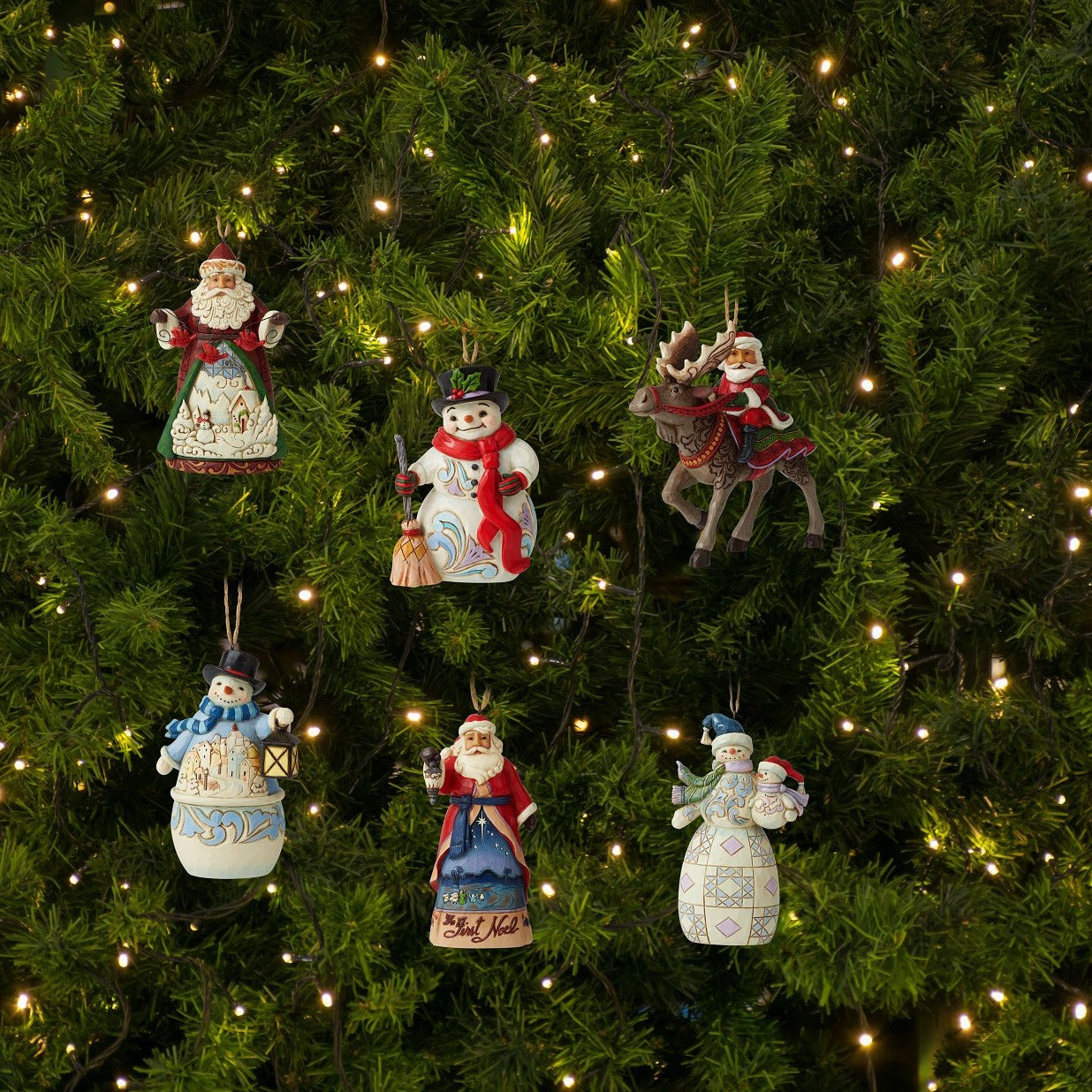 Jim Shore Heartwood Creek Santa Riding Moose Hanging Ornament  Designed by award-winning artist and sculptor Jim Shore for Heartwood Creek. Santa doesn't always travel by reindeer
