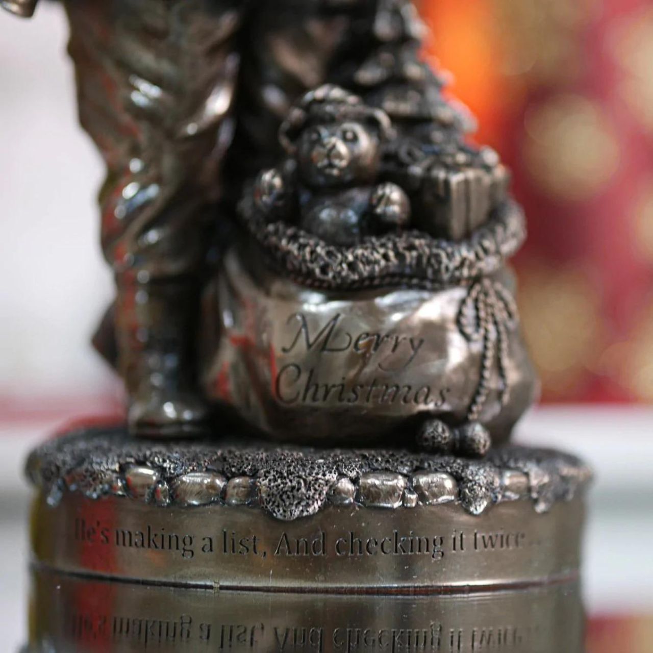 Genesis Ireland Santa's Check List  A stunning ornament that is sure to bring festive cheer to your home, beautiful bronze coloured Christmas decoration, by Genesis Ireland.  Depicting Santa Claus checking his list before setting of on Christmas Eve. Have you been Naughty or Nice? Let the magic of Christmas fill your home with this gorgeous sculpture for many years to come.