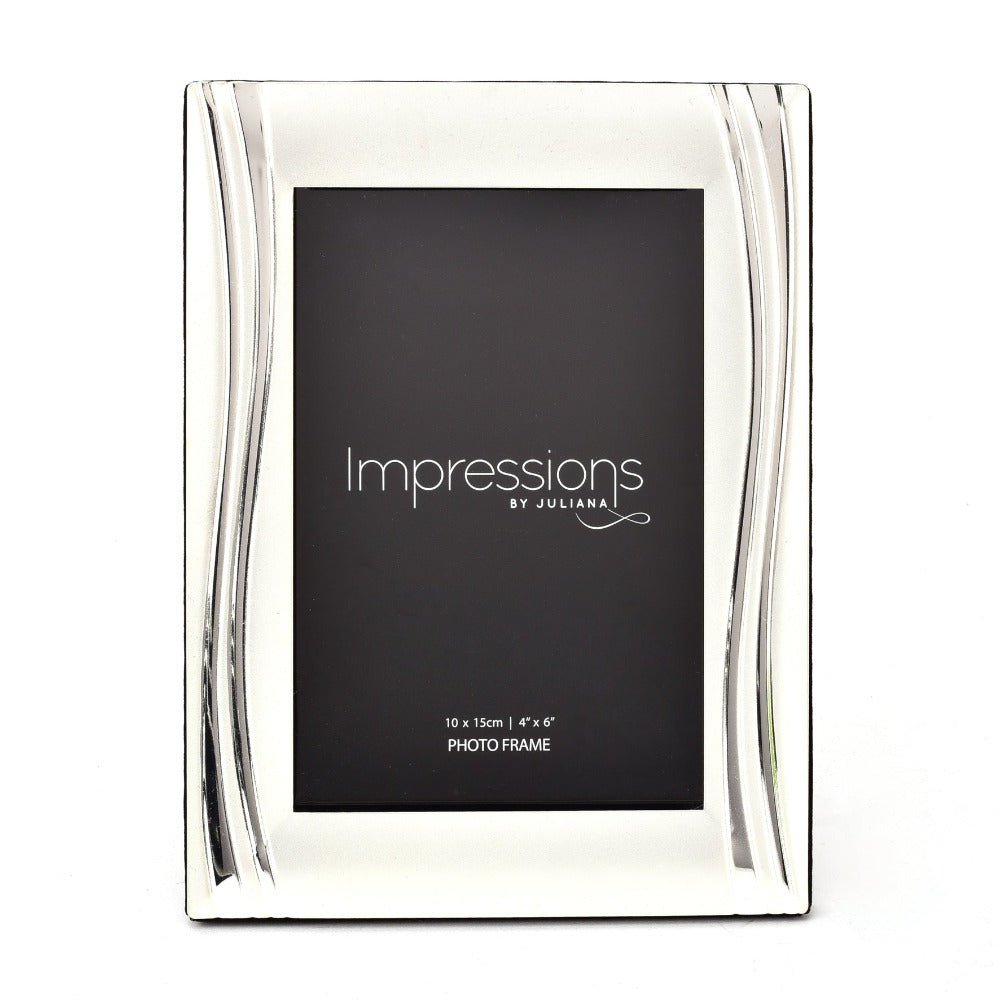 Satin Silver-Plated Photo Frame Shiny Wavy Design 4" x 6"  Preserve a special moment with this beautiful silver-plated photo frame.  Complete with a shiny wave design and a satin finish, this accessory adds a subtle touch of glamour to any spac