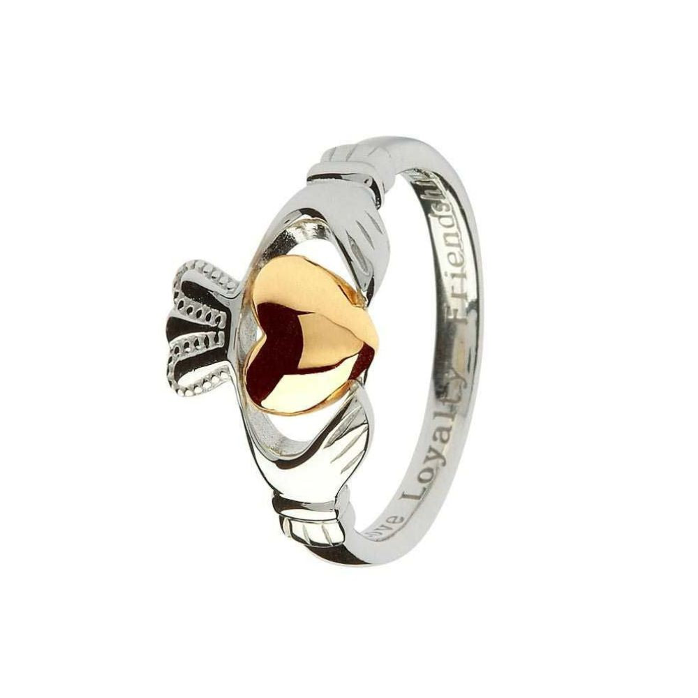 Sterling Sliver hands carefully clasp a 10 karat gold heart in this sophisticated rendition of the Claddagh. Exquisitely detailed, the ring contains the three components of the famous Irish symbol with a polished grace. Gleaming silver hands encircle the pool of flawless gold, each finger intricately etched into the silver. The crown of loyalty arches beautifully on top of the two. The inner ring engraved with the three words that encompass the Claddagh: Love, Loyalty, and friendship.