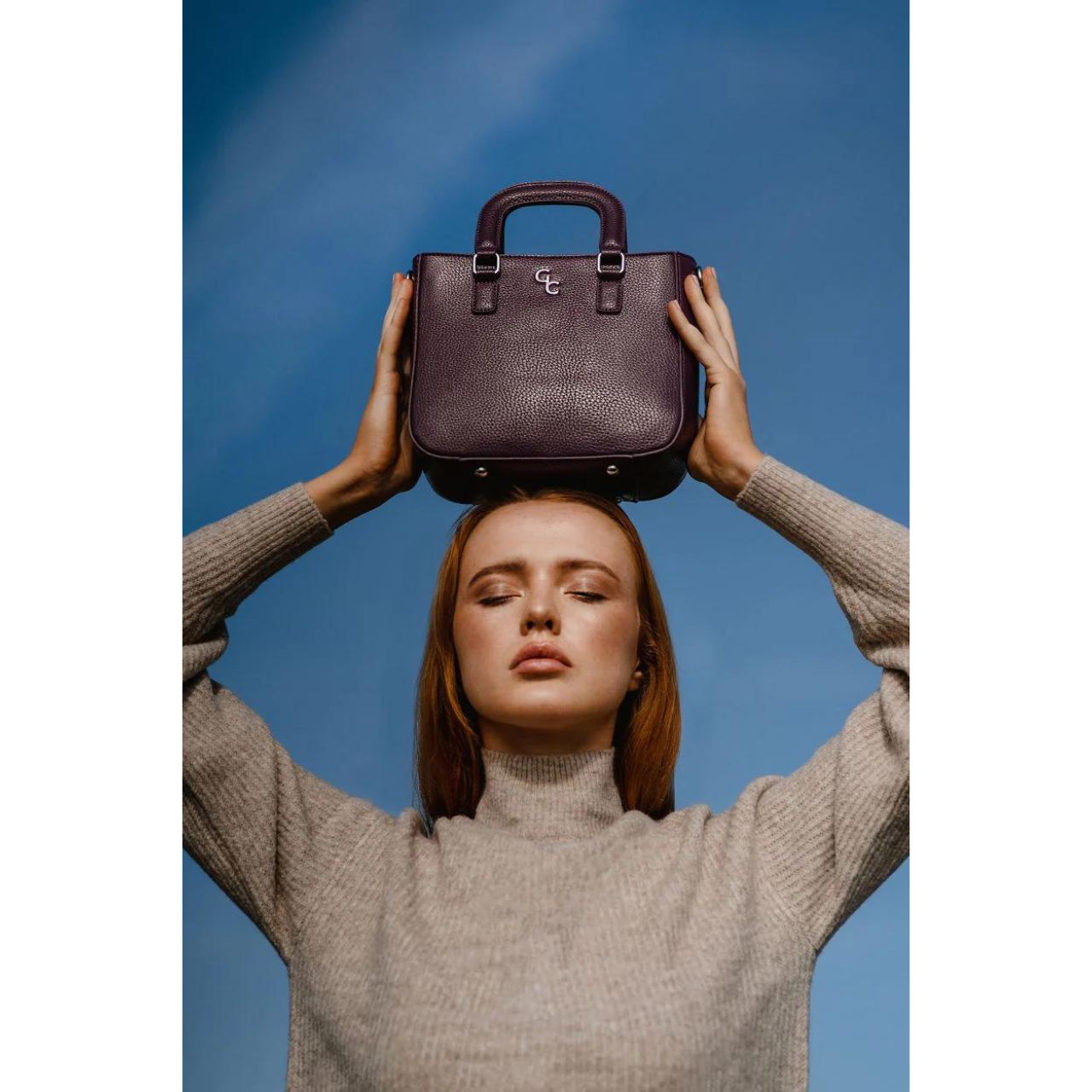 Galway Crystal Shoulder Bag - Mulberry Complete your look with our standout Galway Crystal Mulberry Shoulder bag. This stunning bag has top handles for carrying in your hand or it can be worn cross body with the detachable leather strap, instantly taking you from day to night.