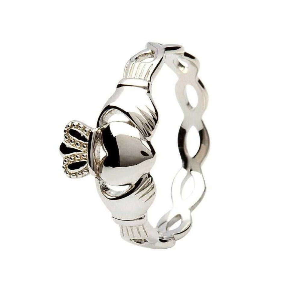 Symbolizing the essence of true love this sterling silver Claddagh ring is an exquisite piece of craft. The ring shines in sterling silver while it has an intertwining Celtic knot design that completes the design. The ring combines the concepts of Claddagh and Celtic knots into one symbolizing the endless nature of human spirit and love.