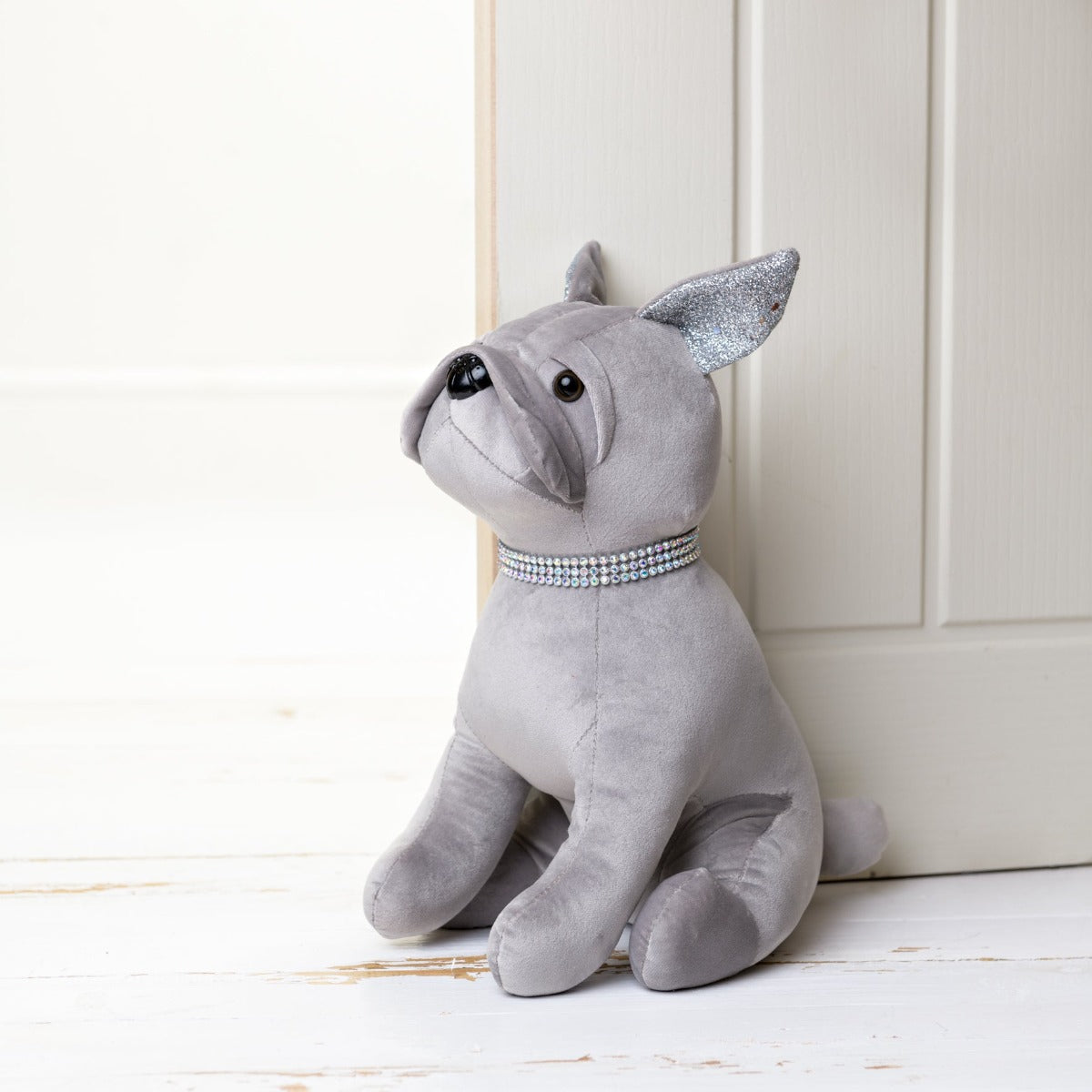 Hestia Silver Luxe Diamante Dog Door Stop  Bring some warmth and charm to any room with this diamante dog door stop. From the Silver Luxe collection by HESTIA® this door stop features a diamante collar and is both cute and elegant. A fashionable addition for any home.