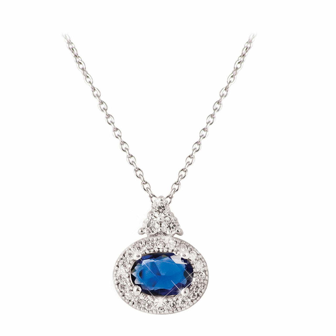 Silver Pendant Oval Sapphire White Surround by Tipperary Crystal  This radiant vintage-inspired pendant will be treasured for years to come. Crafted in silver, this feminine look features a beautiful oval shaped rich blue crystal. Shimmering round clear crystals form a halo around the dazzling center stone