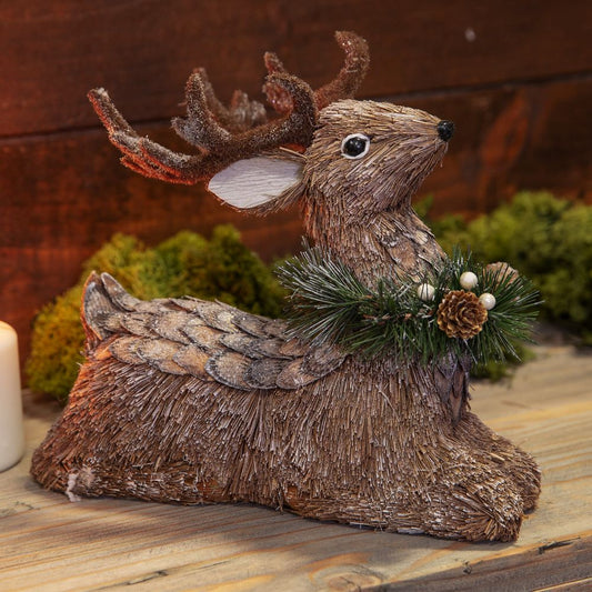 Christmas Sitting Reindeer Ornament  Create a rustic and comforting Christmas woodland decor theme with this handmade straw reindeer figurine.