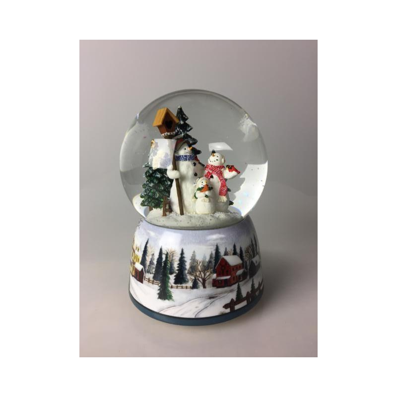 Snow Globe Snowman Family  Featuring festive scenes and characters, add charm and personality to your home this Christmas with our fabulous snow globes  The scene in the 100 mm globe turns to the winter melody "Winter Wonderland"