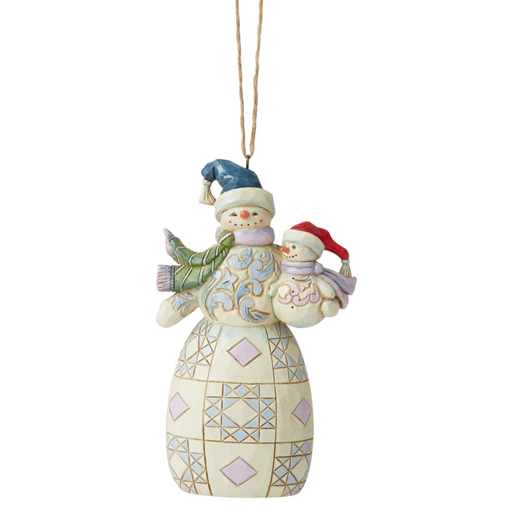 Jim Shore Heartwood Creek Snowman with Baby Hanging Ornament  Designed by award-winning artist and sculptor Jim Shore for Heartwood Creek. Ornament hangs by jute rope and features a handcrafted look. Item is packed in a branded craft box. Unique variations should be expected as product is hand painted. Not a toy or children's product. Intended for adults only.