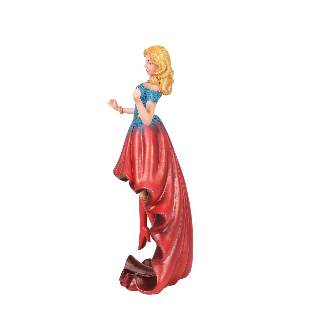 DC Comics Supergirl Couture de Force Figurine  Fierce meets fabulous in this meticulously reimagined hand-crafted figure inspired by DC Comics most iconic heroines and villains. Shimmering with metallic paint accents on her flowing stylish skirt, Supergirl is midflight ready to conquer the world.