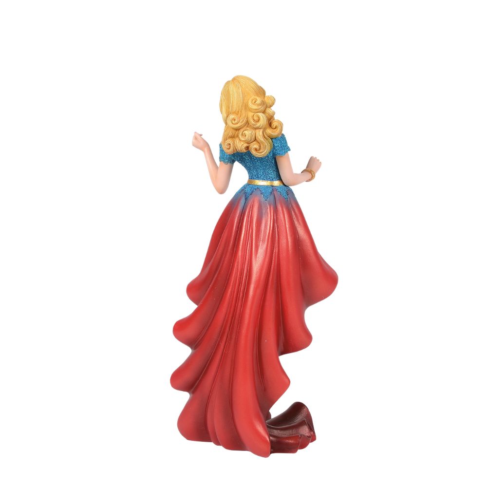 DC Comics Supergirl Couture de Force Figurine  Fierce meets fabulous in this meticulously reimagined hand-crafted figure inspired by DC Comics most iconic heroines and villains. Shimmering with metallic paint accents on her flowing stylish skirt, Supergirl is midflight ready to conquer the world.