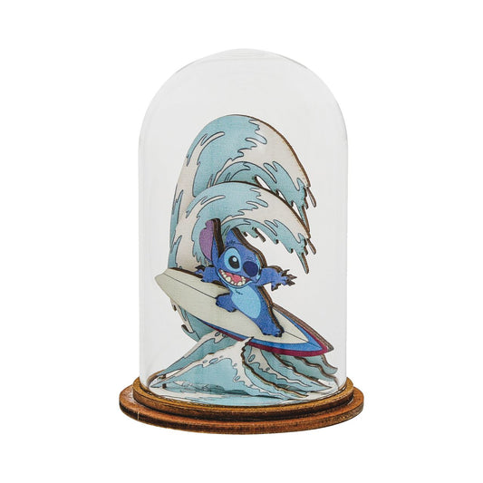 Disney Surf Fun Stitch Figurine Kloche  This beautifully layered figurine makes you feel that you are right there catching a wave with Stitch himself. Perfect keepsake for any Lilo and Stitch fan. This classic, decorative Kloche will make a stunning display in any home. Material: Glass with a wooden base. Packaging: Presented in a branded unique giftbox.