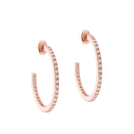 Circle Pave Rose Gold Large Hoop Earrings by Tipperary Crystal  These classic Tipperary Crystal Circle Pave Rose Gold Large Hoop Earrings represent an iconic and timeless fashion statement.