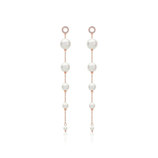 Romi Dublin Rose Gold Drop Pearl Earrings  The classics are what draw us back time and time again and nothing is more classic than Pearls. We were inspired with this collection to bring a modern twist to a timeless classic.