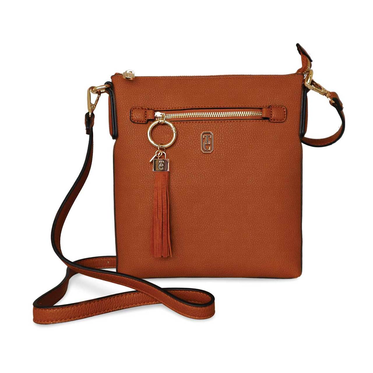The Chelsea Cross Body Pouch Tan by Tipperary Crystal  The Chelsea Cross Body Pouch Tan - Yellow gold hardware The versatile and trendy Chelsea can be worn as a cross body and also over the shoulder. The Chelsea has an adjustable strap and easily accessible outside pocket and secure front zip pocket. Metal hardware detail finish off this stylish bag in rose gold or yellow gold.