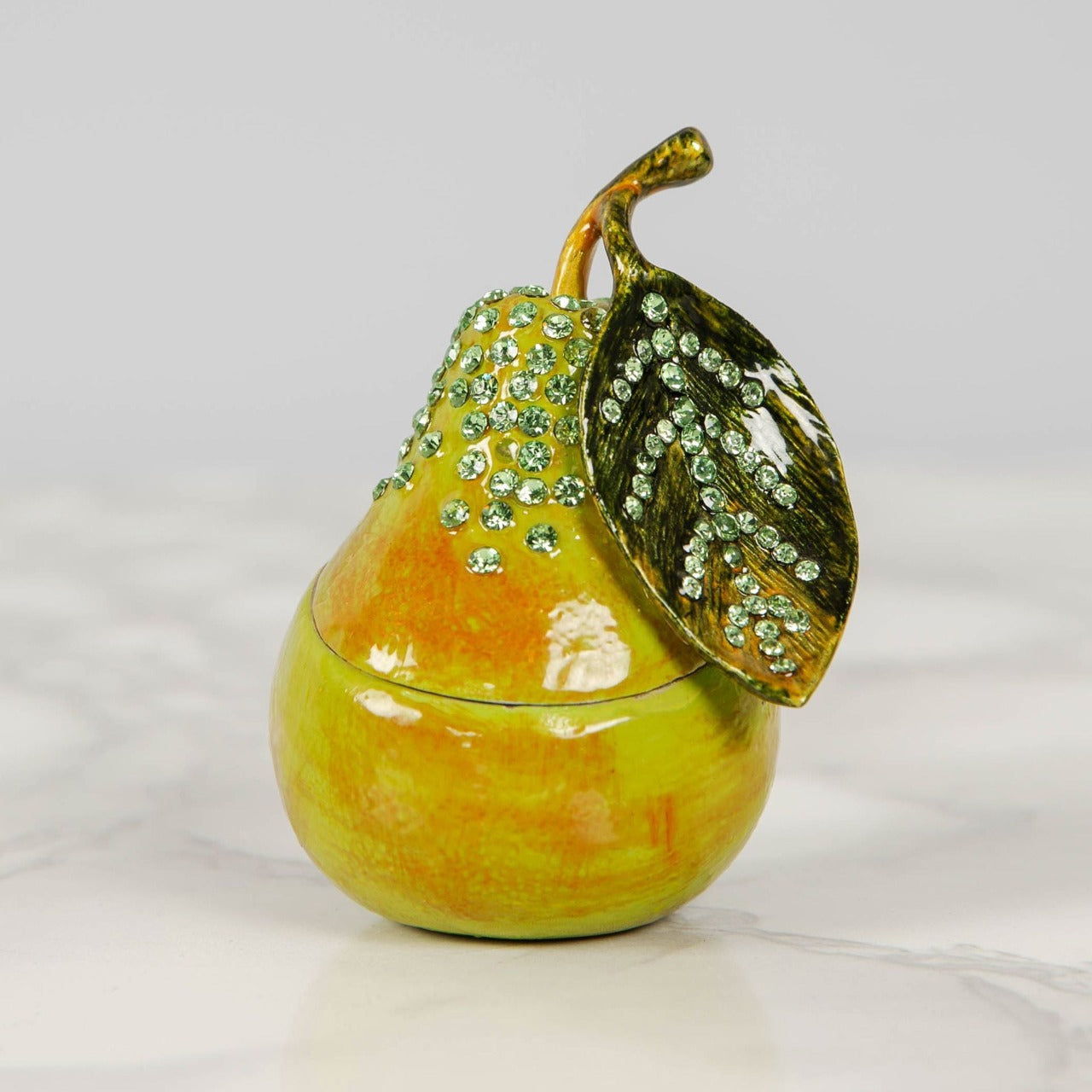 Treasured Trinket - Pear  A beautiful die-cast metal pear trinket box with crystal embellishments. From Treasured Trinkets by STRATTON® - hand painted, collectable trinkets to be treasured for a lifetime.