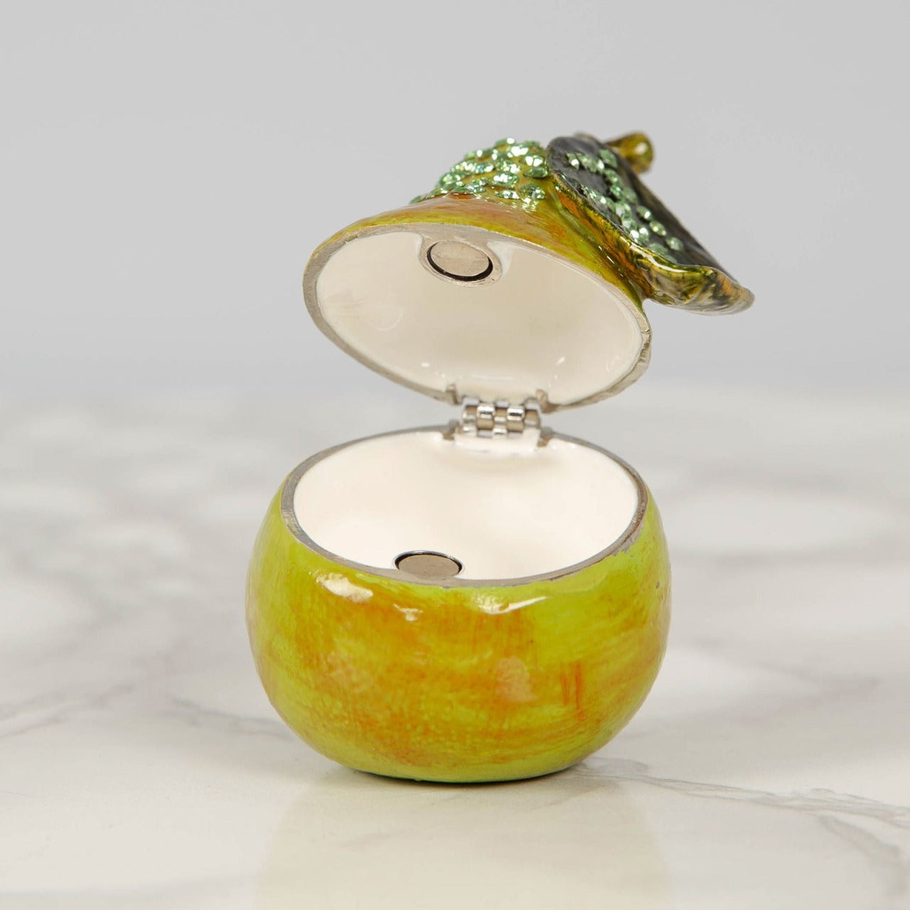 Treasured Trinket - Pear  A beautiful die-cast metal pear trinket box with crystal embellishments. From Treasured Trinkets by STRATTON® - hand painted, collectable trinkets to be treasured for a lifetime.