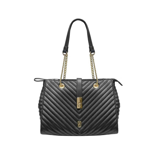 Tipperary Crystal Versailles Shoulder Bag Black - Yellow Gold Hardware  Rendered in a chevron stitching, the Versailles Handbag is a complete luxury. The contrast of the yellow gold-toned chain straps against the soft luxurious chevron quilting makes for an effortlessly chic accessory that will bring you from day to night with ease.