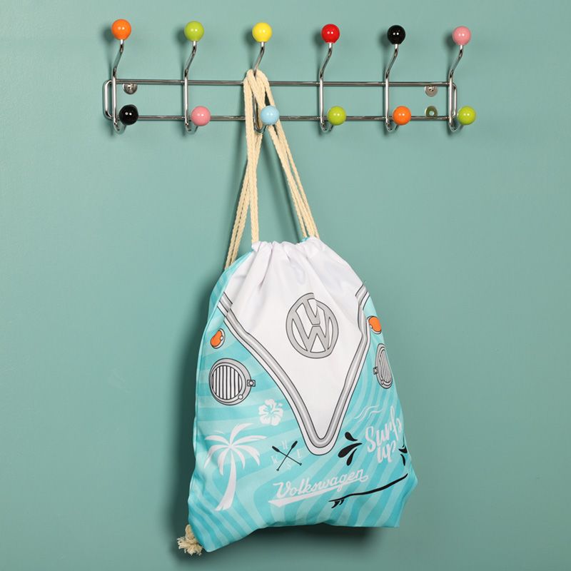 Volkswagen VW T1 Camper Bus Surf Adventure Drawstring Bag  The Volkswagen VW T1 Camper Bus Summer Surf Drawstring Bag is ideal for any fan of the classic VW camper. Made of sturdy polyester for lasting use, the design features a vivid sleeping Camper Bus against a bright blue, perfect for bringing summer love wherever you go.