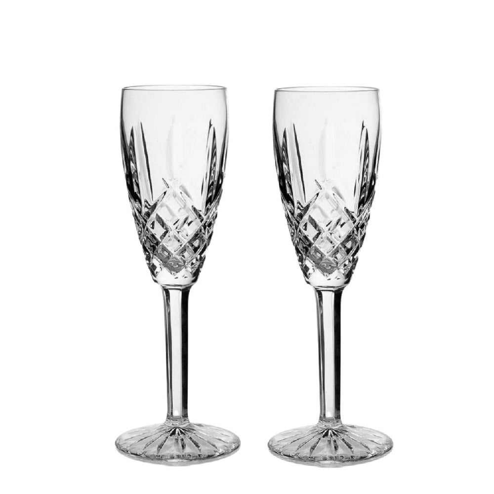 Waterford Crystal Araglin Flute Champagne Pair  The Araglin Collection by Waterford is characterized by diamond and vertical wedge cuts and an elegant tulip design, creating stunning crystal and stemware with a truly unsurpassed shine and brilliance.