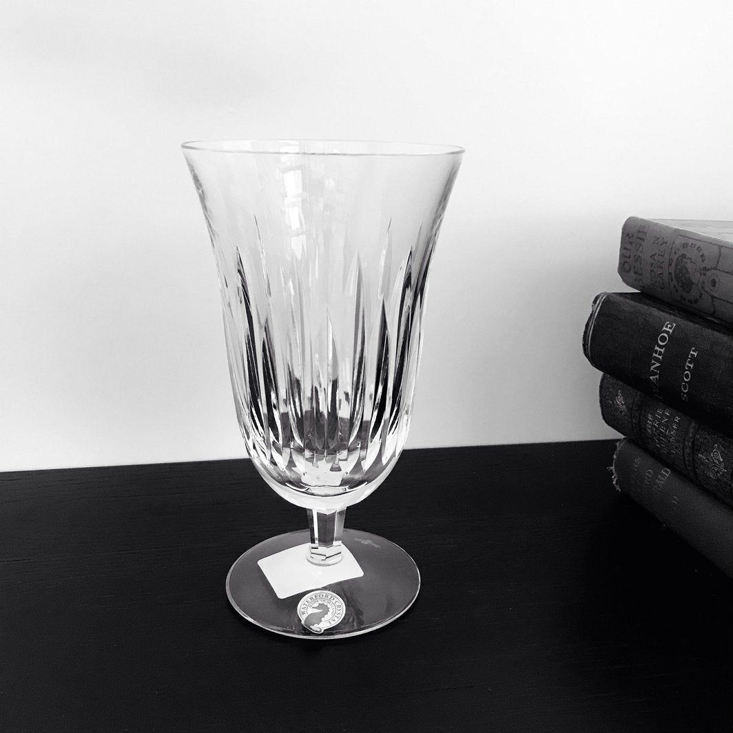 Waterford Crystal Carina Footed Iced Beverage / Iced Tea  Carina is inspired by the girls' name meaning "pretty" and features simple, yet elegant crystal cuts that add a brilliant touch to any table.