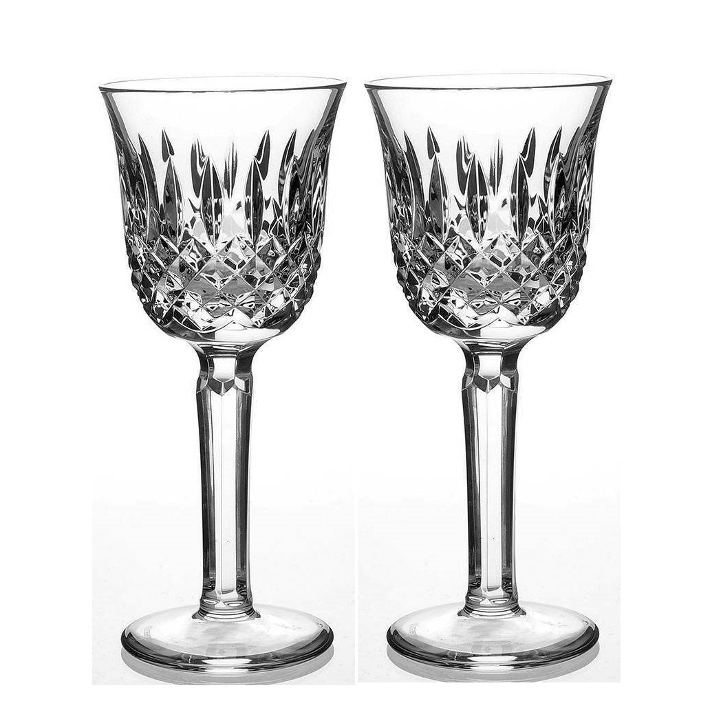 Kelsey Wine Pair by Waterford Crystal  Kelsey Collection by Waterford is characterized by a simple demi-lune shape accented by an open diamond pattern and adorned with single wedge cuts.