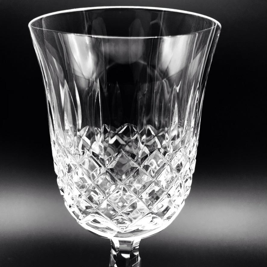 Kelsey Wine Pair by Waterford Crystal  Kelsey Collection by Waterford is characterized by a simple demi-lune shape accented by an open diamond pattern and adorned with single wedge cuts.