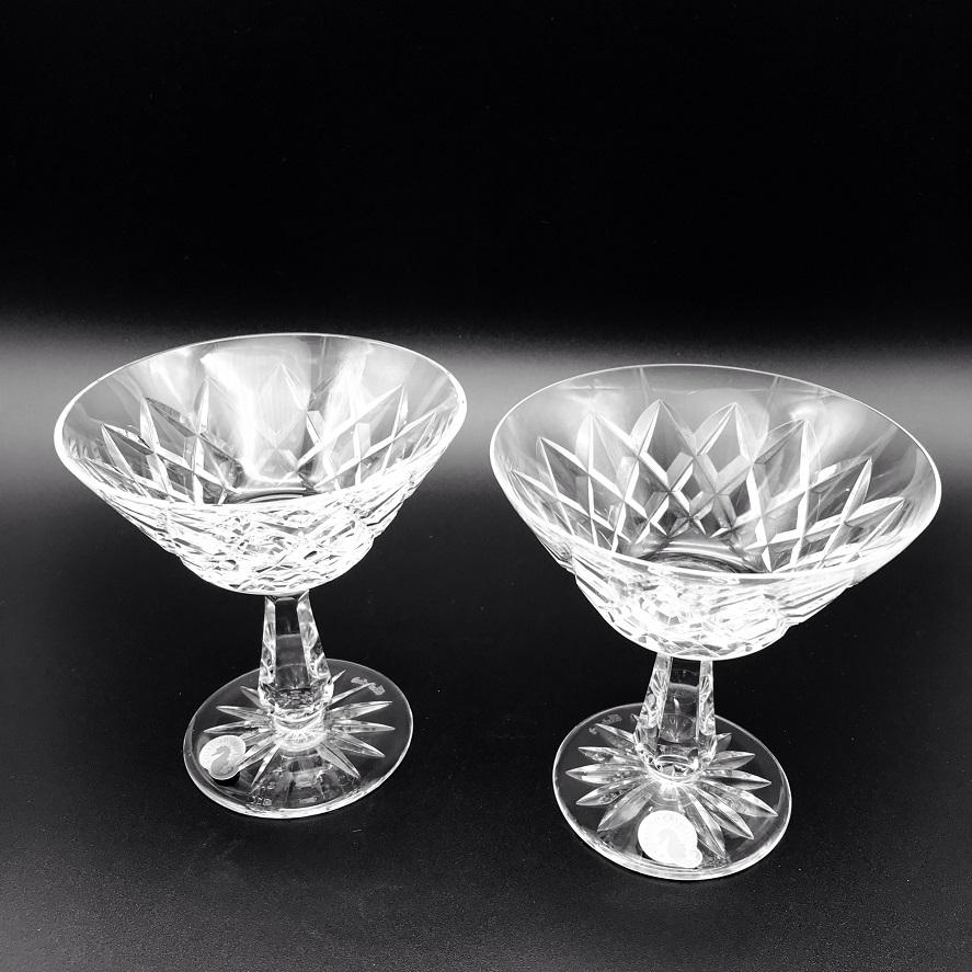 Waterford Crystal Kinsale Saucer Champagne Pair  Waterford Crystal Kinsale champagne coupe or low sherbet glass. This intricate diamond cuts to a clean delicate bowl, our martini glasses and cocktail glasses are crafted for enjoying a diverse range of Champagne or Cocktails.