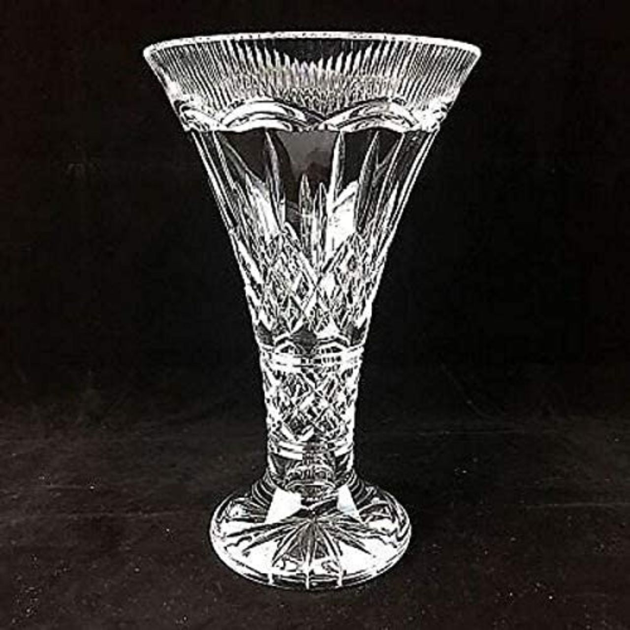 Lismore 35cm Statement Vase by Waterford Crystal  Waterford Lismore Statement Vase - The Waterford Lismore pattern is a stunning combination of brilliance and clarity. You can't improve on nature, but you can come close with the Lismore Statement Vase. Accentuate the beauty of roses, floral arrangements and cut flowers with this stunning fine crystal vase patterned with Lismore's signature diamond and wedge cuts.