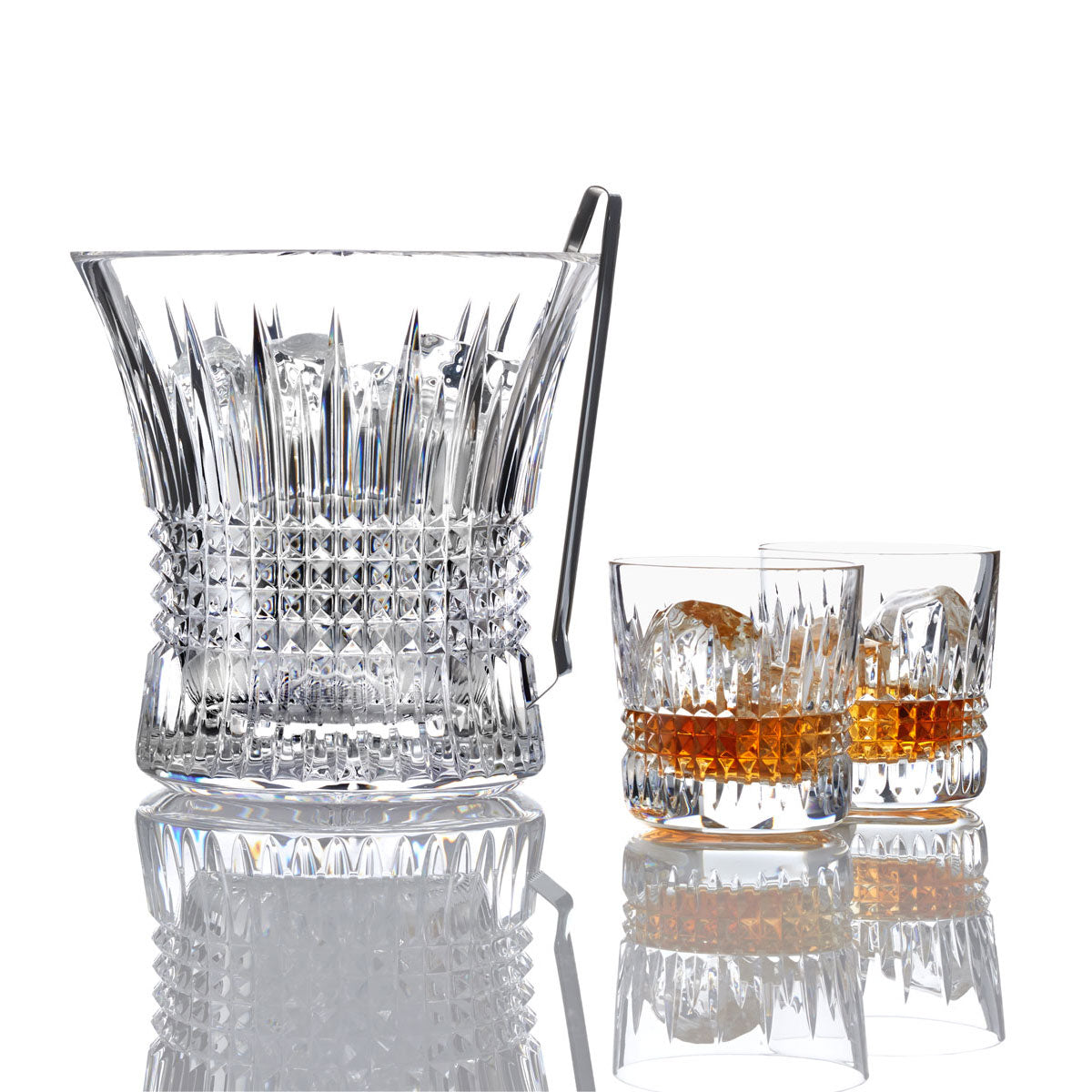 Lismore Diamond Ice Bucket With Tongs by Waterford  The Lismore Diamond pattern is a strikingly modern reinvention of the Waterford classic, characterized by intricate diamond cuts rendered in radiant fine crystal.