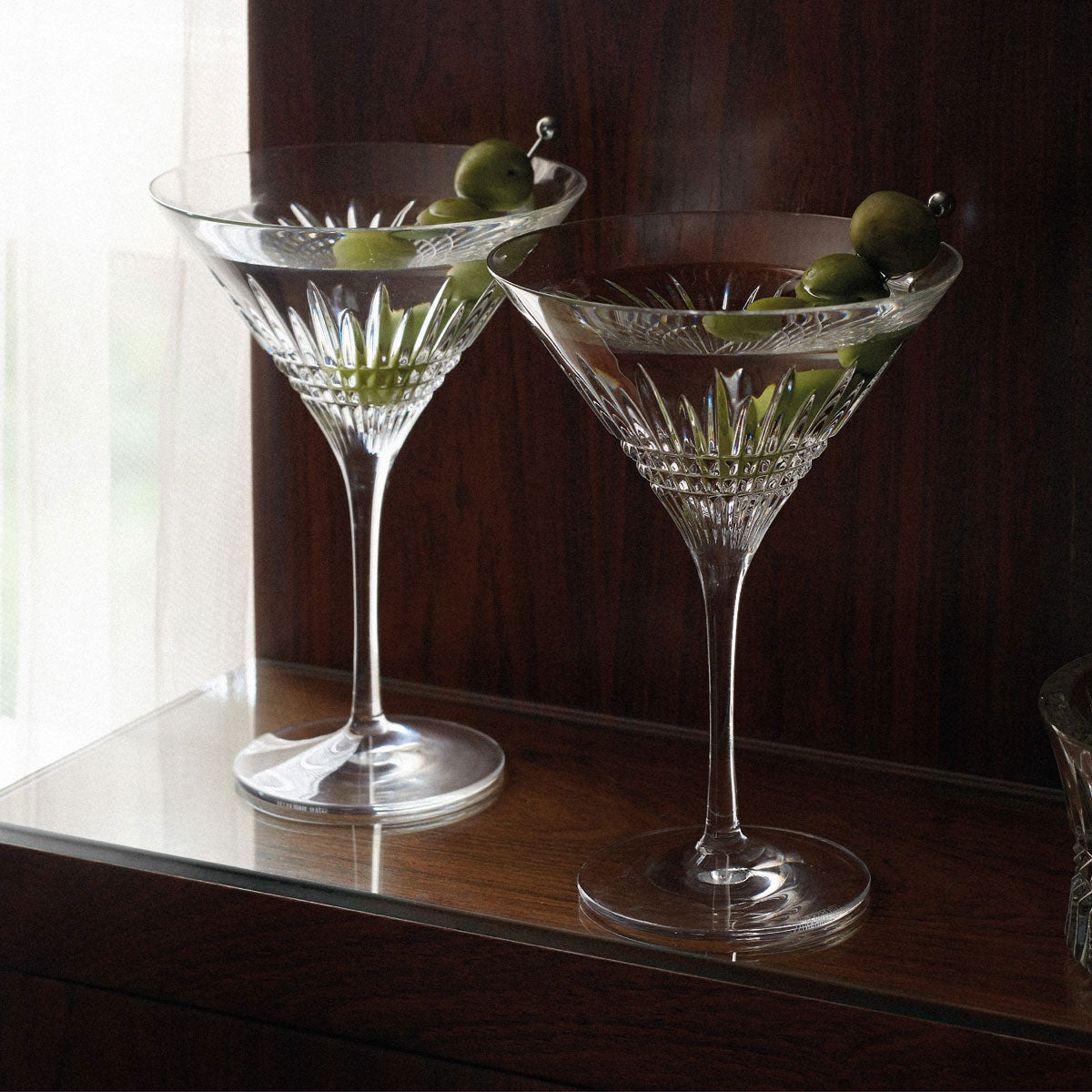 Waterford Crystal Lismore Diamond Martini Glasses Pair  The Lismore Diamond pattern is a strikingly modern reinvention of the Waterford classic: characterized by intricate diamond cuts rendered in radiant fine crystal. The clarity of this radiant Lismore Diamond Martini Glass Pair, ensures that the rich colour of its contents is highlighted beautifully: serving as a feast for the eye as well as the palette.