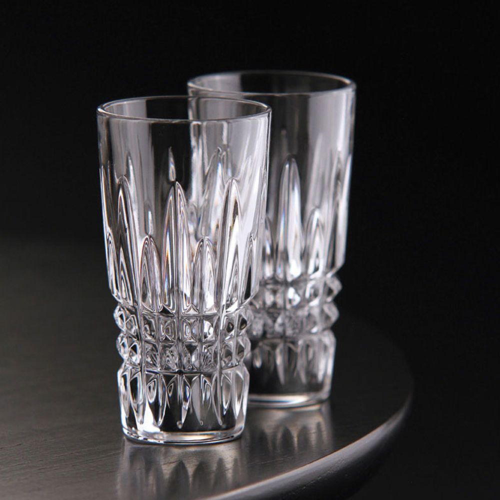 An entertaining essential, this amazingly cut Lismore Diamond crystal ice bowl also includes 12 elegant Lismore Diamond shot glasses, and a metal insert that keeps bottle and glasses on ice for seamless serving.