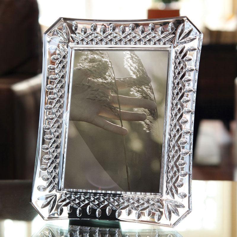 Waterford Crystal Lismore Picture Frame 8 x 10in  Bring your treasured memories to life with this stunning Lismore 8 x 10 Picture Frame : a generously sized crystal photo frame that’s perfect for displaying on a desk, mantle or table.