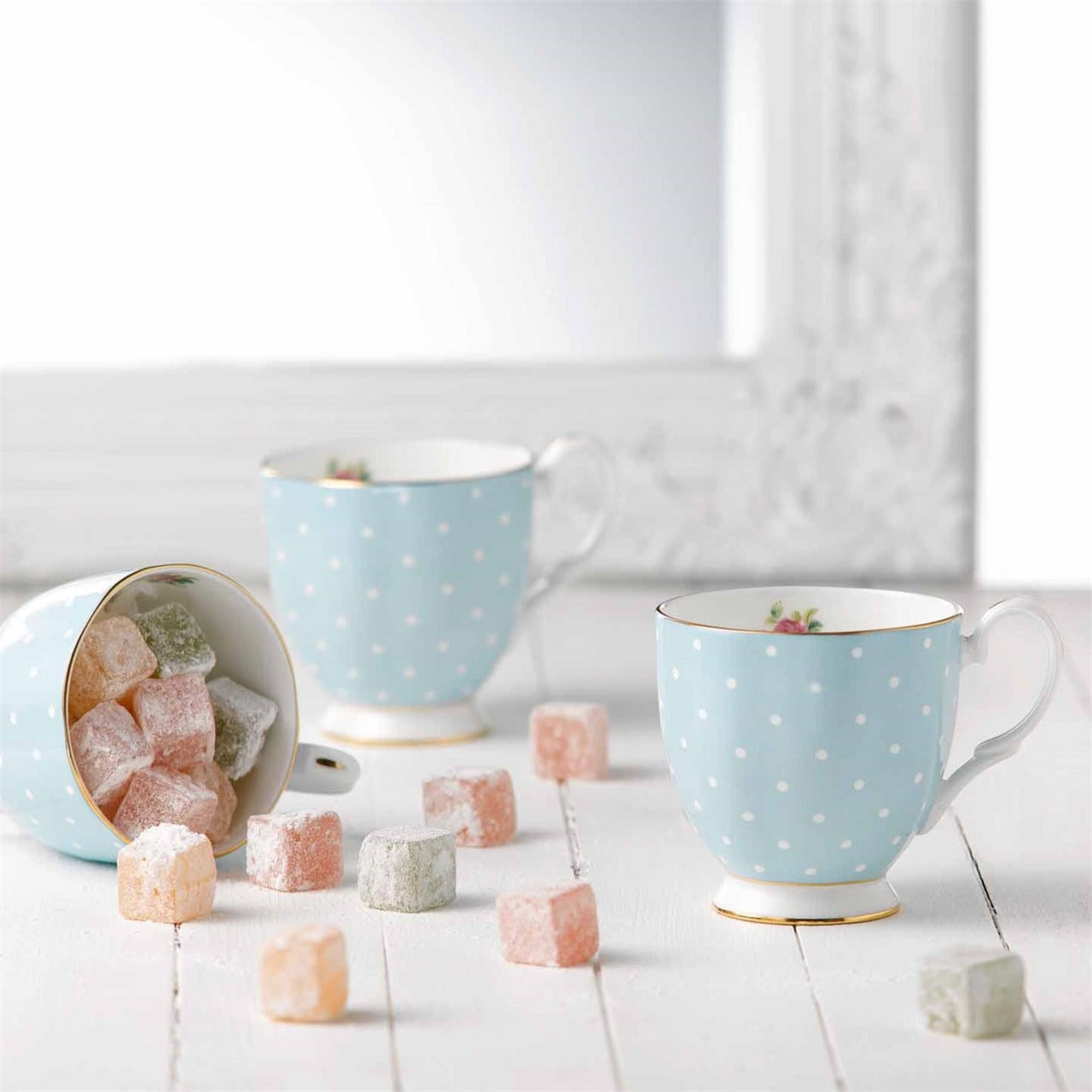 Wedgwood Royal Albert Polka Blue Mug  Vibrant and vivacious, Polka Blue is a beautiful addition to the vintage patterns that have made Royal Albert famous the world over. Youthful and exuberant, this collection is charmingly fashioned in fine bone china, and combines classic form with intricate detailing, vibrant colours and a lustrous gold rim.