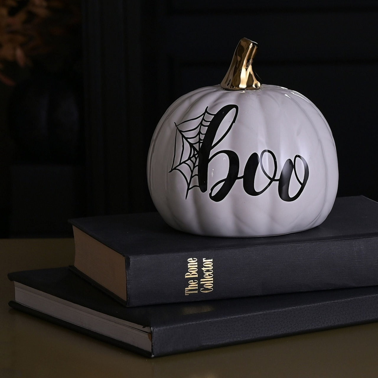 White Pumpkin Halloween Decoration  A white pumpkin decoration by THE SEASONAL GIFT CO®.  This spooky pumpkin will add to the spinetingling atmosphere of haunted houses this Halloween.