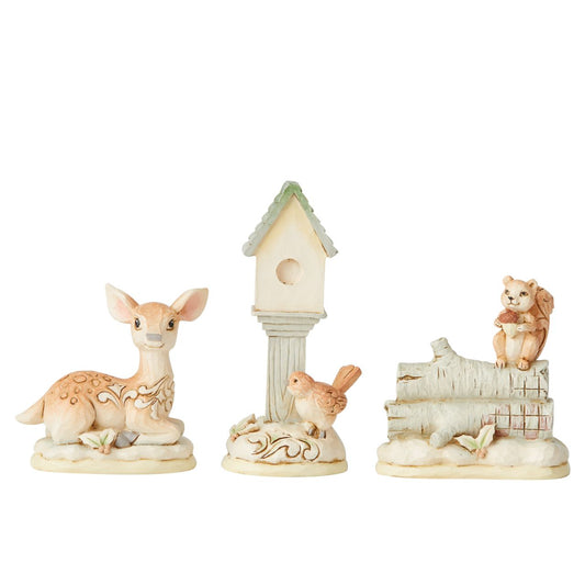 Jim Shore White Woodland Mini Accessory Set of 3  Beautifully decorated in delightful detail, this charming set of three White Woodland forest friends, a Bird with Bird House, a Deer and an adorable Squirrel, feature a wintry colour palette and Jim Shore's whimsical folk art design with holiday accents.