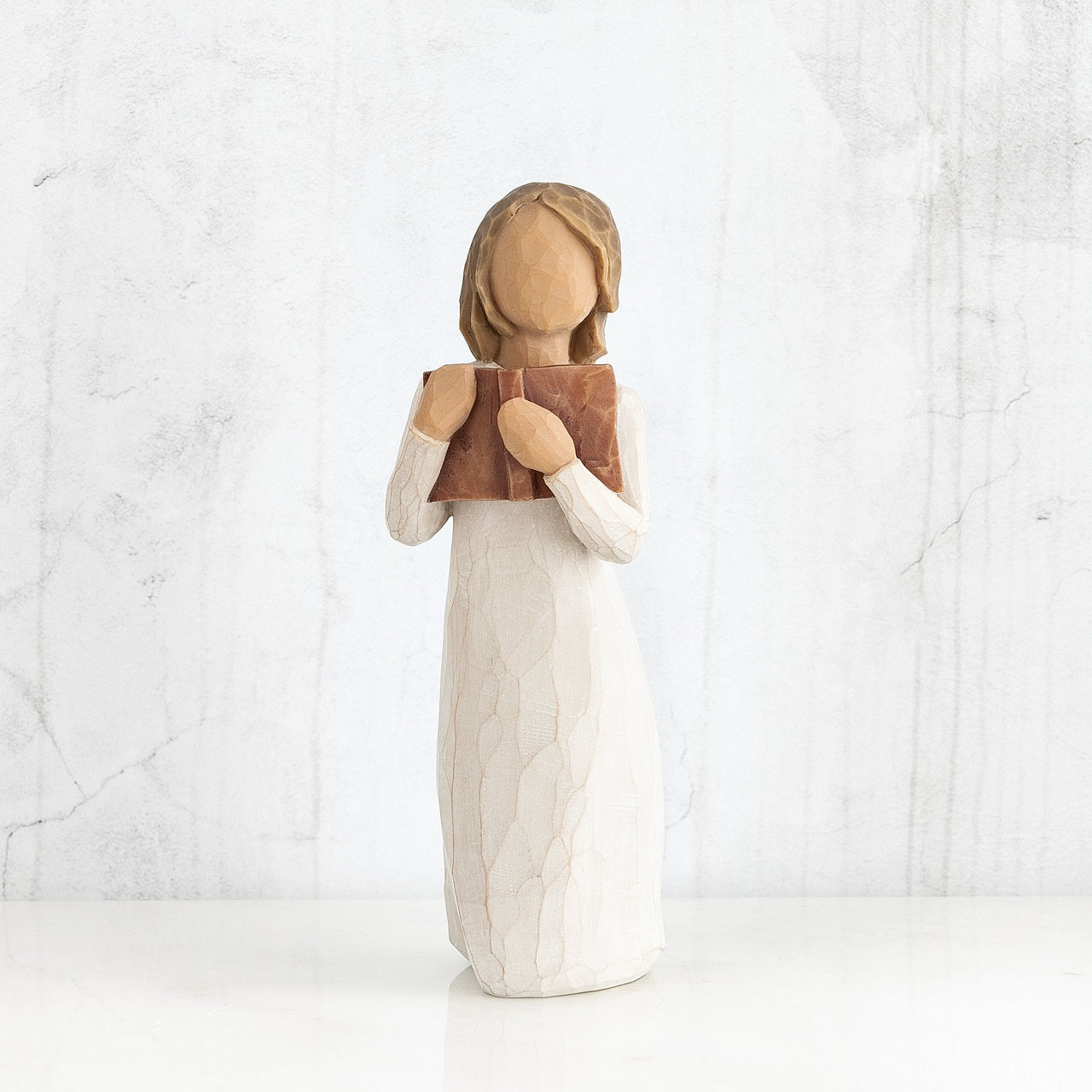 Willow Tree Love of Learning  Willow Tree is an intimate line of figurative sculptures representing sentiments of love, closeness, healing, courage, hope...all the emotions we encounter in life. Artist Susan Lordi hand carves the original of each Willow Tree sculpture.