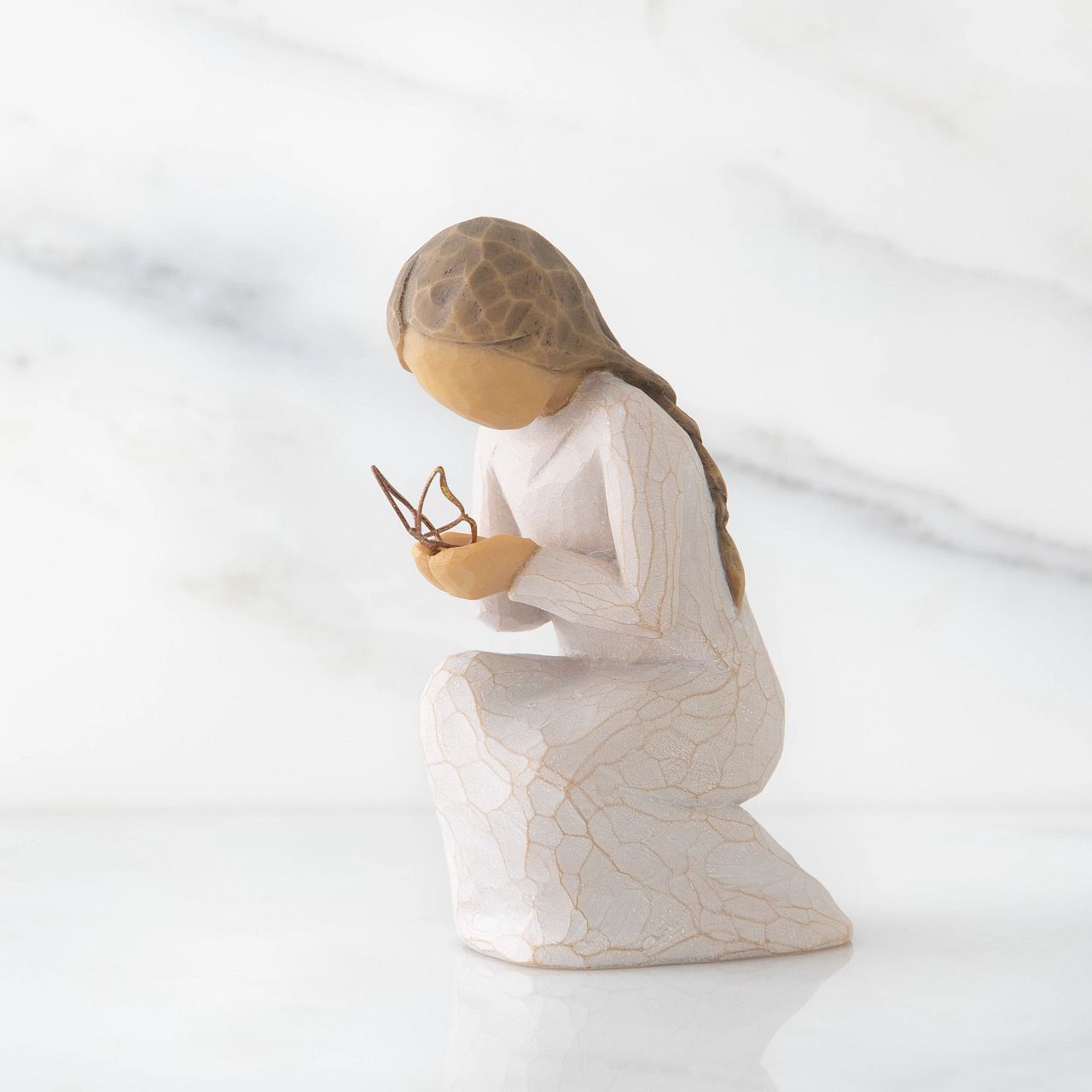Quiet Wonder by Willow Tree  This figure includes a gift tag with the sentiment 'May quiet wonders bring you hope' This figure can be a little reminder to yourself, or someone close to you, of revelations and discoveries found in quiet moments when we are still and present.