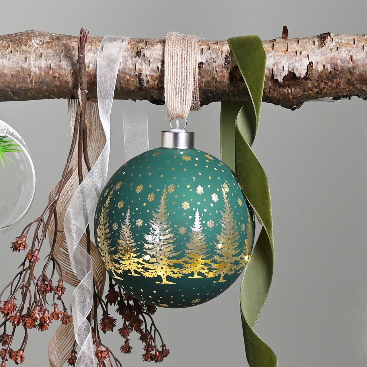 Winter Wilds Medium LED Hanging Glass Light Christmas Decoration  A Winter Wilds LED hanging glass light decoration.  This illuminating decoration is a delightful twist on the traditional this Christmas.